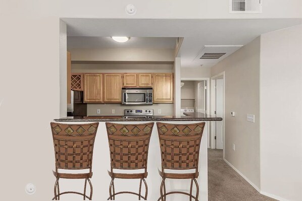 Fridge, microwave, oven, stovetop - Here's to a relaxing stay...pool, spa, sauna, shaded walkways? Ahhh..no cares. (Phoenix)