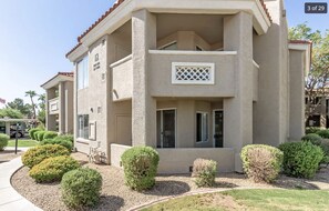 Exterior - Here's to a relaxing stay...pool, spa, sauna, shaded walkways? Ahhh..no cares. (Phoenix)