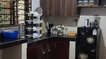 Fridge, microwave, cookware/dishes/utensils