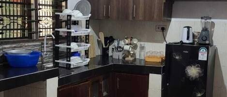 Fridge, microwave, cookware/dishes/utensils