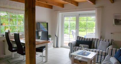 4 person vacation home, garden with fence and gate