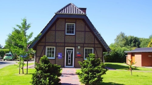 4 Personen Fachwerkferienhaus mit Kamin und Badewanne in erster Reihe zum Deich in Otterndorf