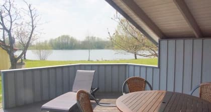 5 person vacation home with sauna, canoe and wonderful lake view in Otterndorf