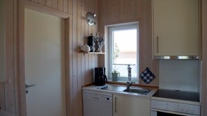 Frigorífico, horno, lavavajillas y cafetera o tetera