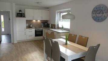 Fridge, oven, dishwasher, coffee/tea maker