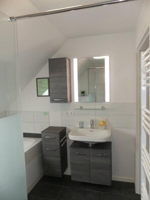 Shower, jetted bath, hair dryer