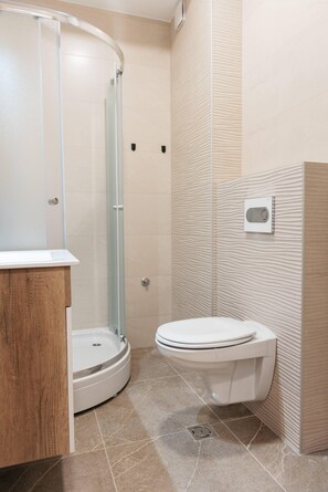 Hair dryer, towels, soap, toilet paper