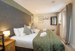 1 slaapkamer, een strijkplank/strijkijzer, wifi, beddengoed