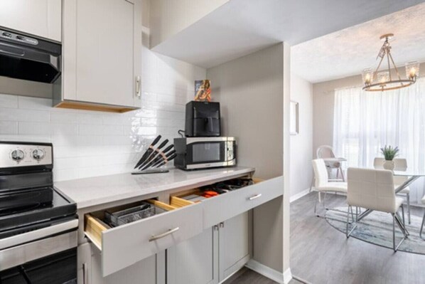 Fridge, microwave, dishwasher, coffee/tea maker