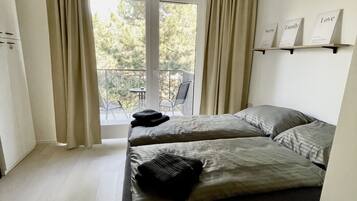 2 dormitorios, tabla de planchar con plancha, wifi y ropa de cama