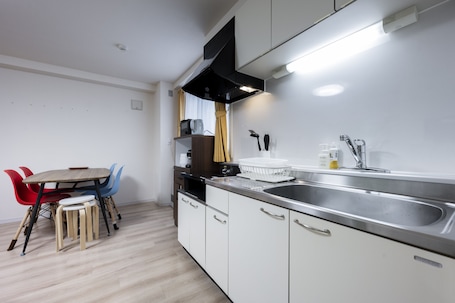 Full-size fridge, microwave, stovetop, electric kettle