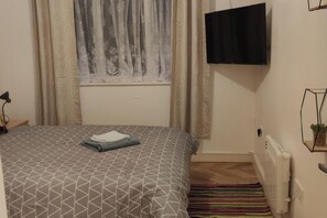 2 habitaciones, tabla de planchar con plancha y wifi gratis