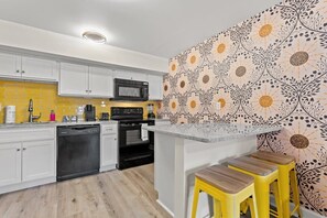 Fridge, microwave, oven, stovetop - TreeHouse Lodge, Walk to Beach, Pet-Friendly 204 (North Myrtle Beach)