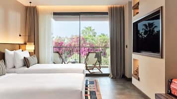 Twin Room, 2 Single Beds, Garden View (General Admission) | Free minibar, in-room safe, desk, laptop workspace