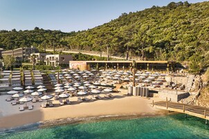 On the beach, beach cabanas, sun loungers, beach umbrellas