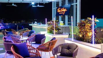 Rooftop bar, pool views, open daily