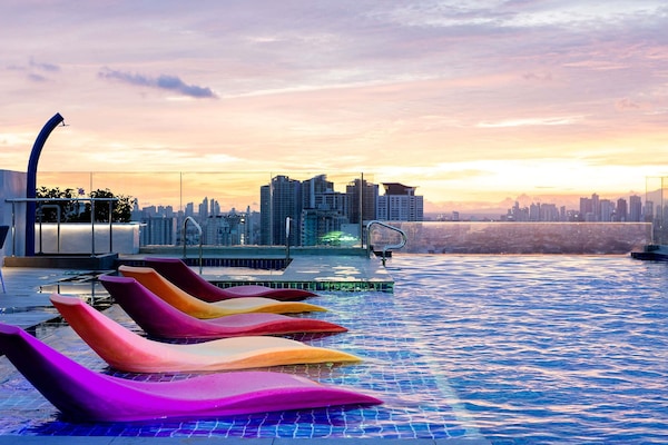 2 outdoor pools, open 8:00 AM to 7:00 PM, pool umbrellas