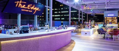 Rooftop bar, pool views, open daily