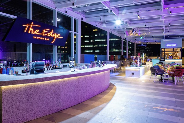 Rooftop bar, pool views, open daily
