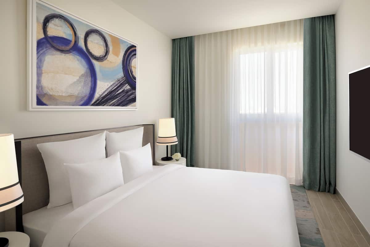 Apartment with 2 Bedrooms | Minibar, in-room safe, individually decorated, desk