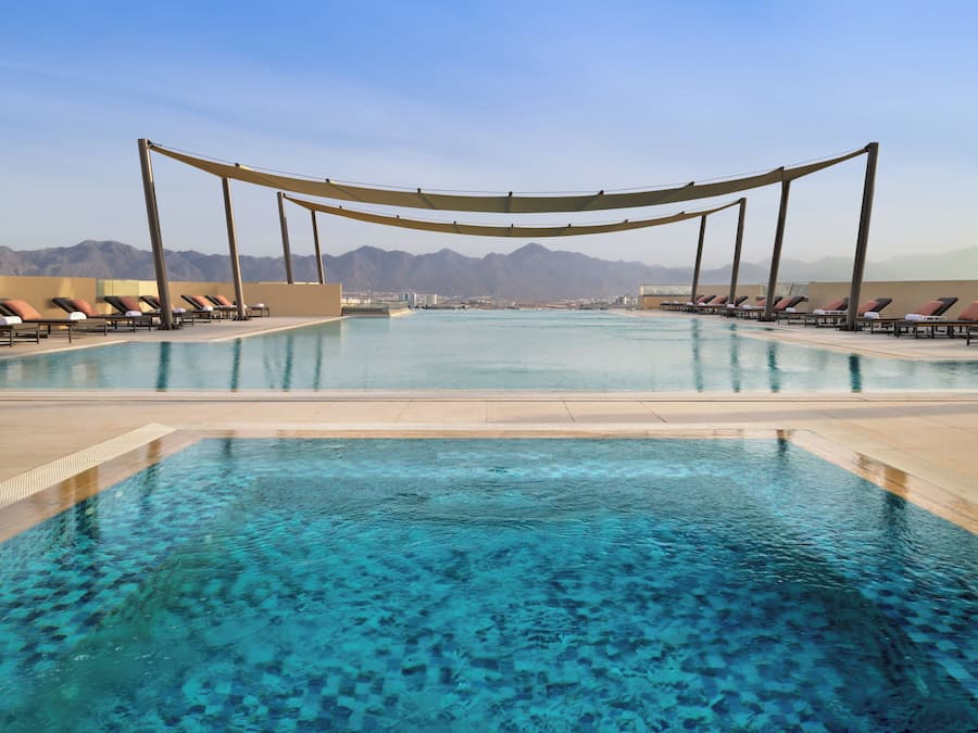 Outdoor pool, pool umbrellas, pool loungers