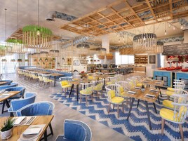 A spacious restaurant with high ceilings, hanging light fixtures, and a variety of seating arrangements including tables and chairs.