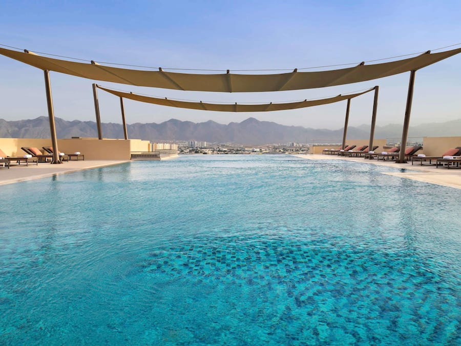 Outdoor pool, pool umbrellas, sun loungers