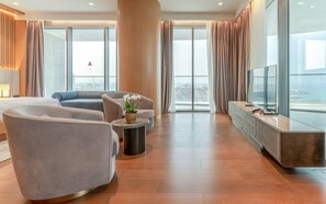 Junior Suite, Sea View | Living area | 120-cm Smart TV with satellite channels, video-game console, toys - Rixos Premium Qetaifan Island North (Lusail)