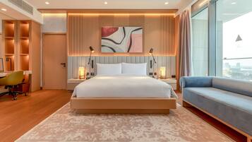 Suite Junior, vue mer | Literie de qualité supérieure, minibar, coffres-forts dans les chambres