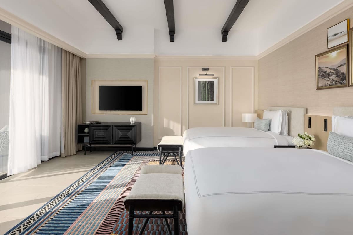 Premium bedding, down comforters, memory foam beds, minibar