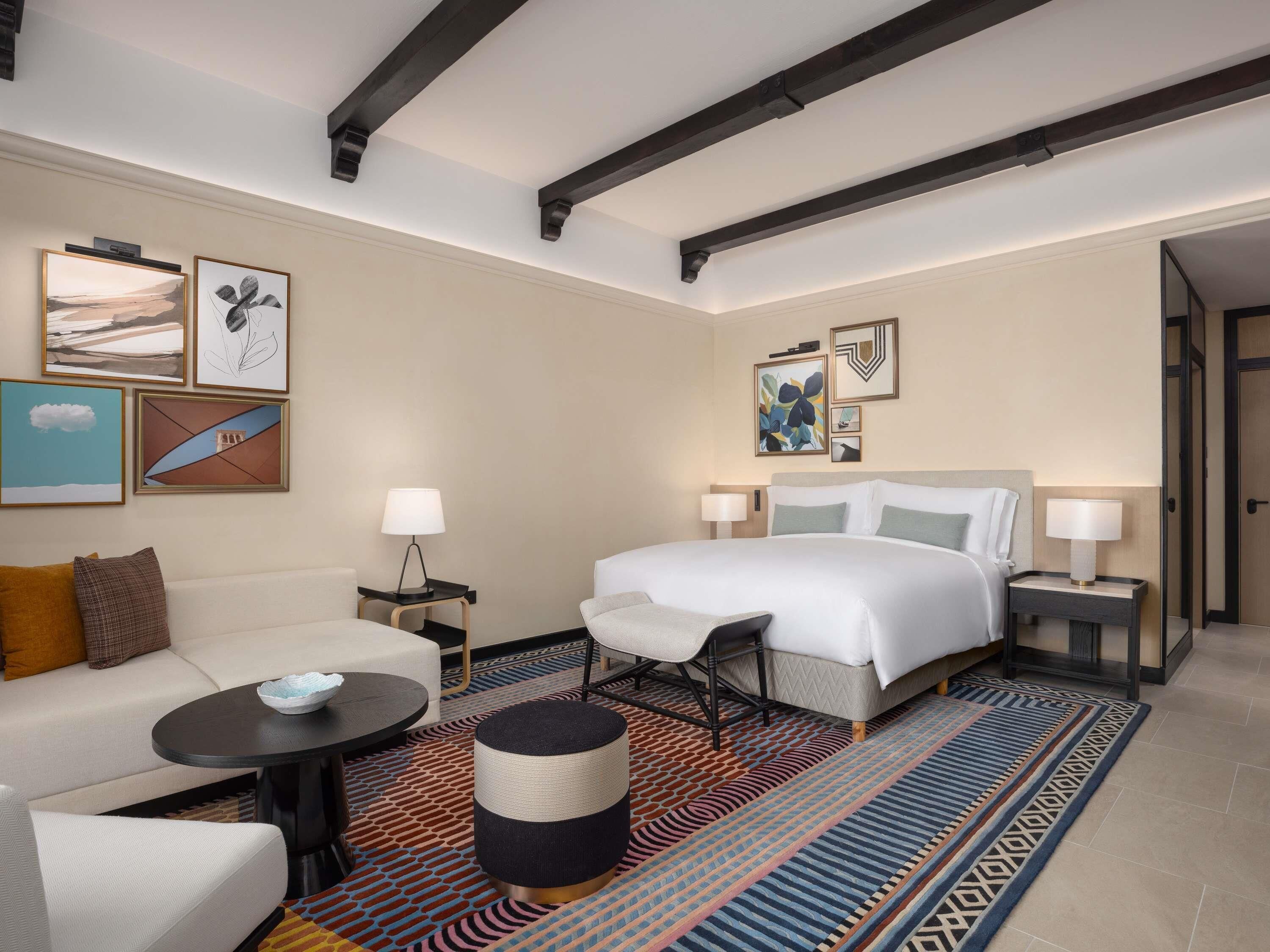 Premium bedding, down comforters, memory foam beds, minibar