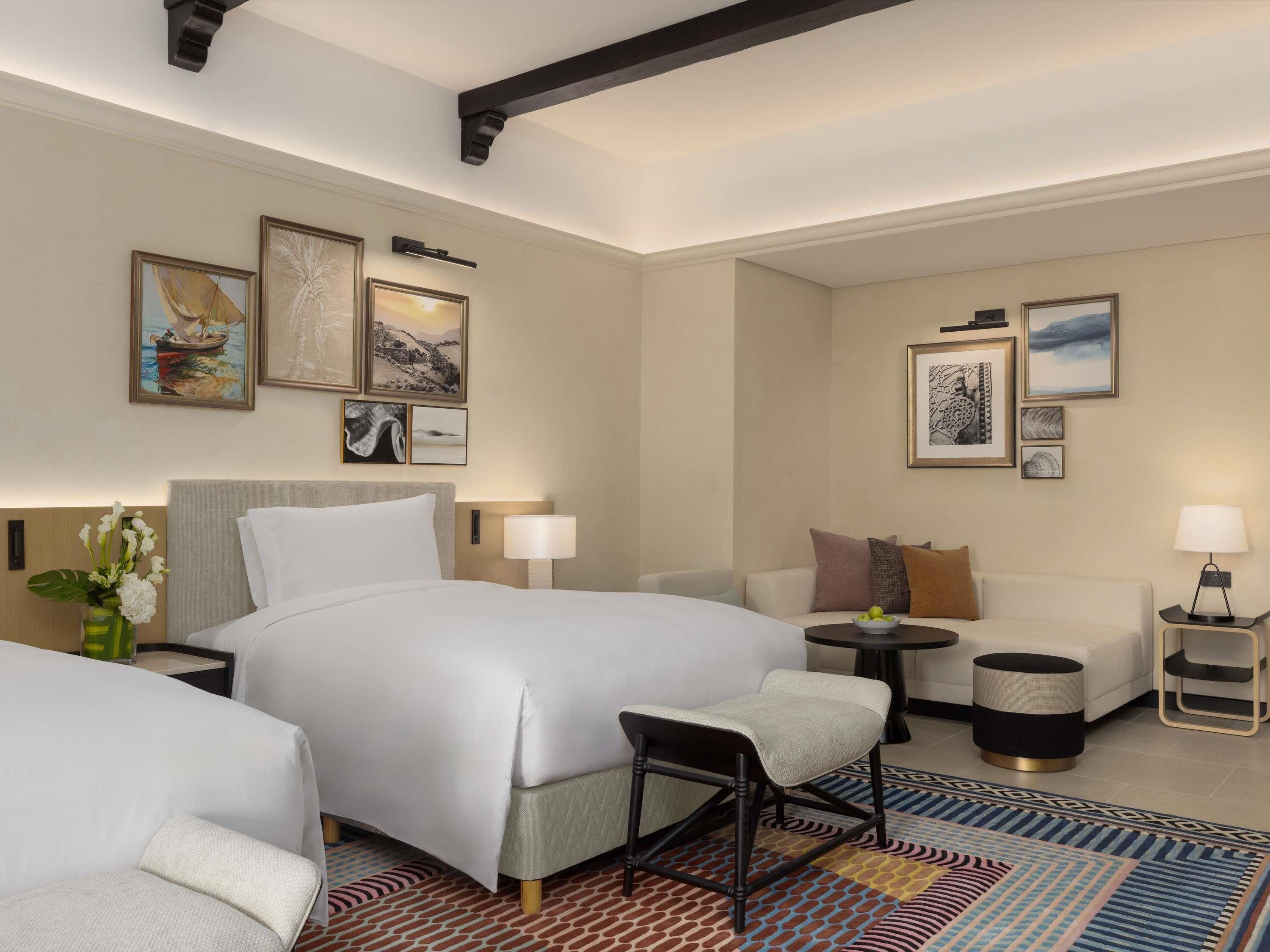 Premium bedding, down comforters, memory foam beds, minibar