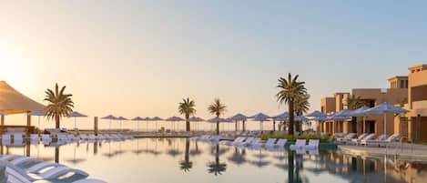 4 outdoor pools, open 6:00 AM to 9:00 PM, pool cabanas (surcharge)