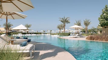 4 outdoor pools, open 6:00 AM to 9:00 PM, cabanas (surcharge)