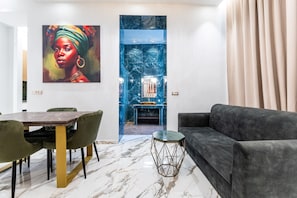 Euphoria Suite | Living room | 43-inch flat-screen TV with digital channels - Royal Gold City Suites by Omilos Hotels (Heraklion)