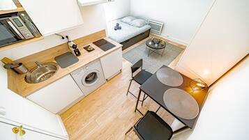 Fridge, microwave, stovetop, coffee/tea maker