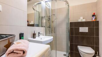 Hair dryer, towels, soap, toilet paper