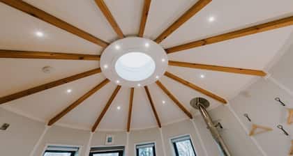 A pet friendly Roundhouse cabin with electric hot tub.