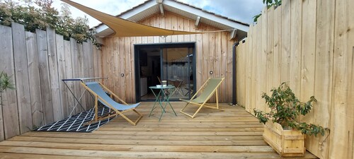 pretty wooden shed with terrace