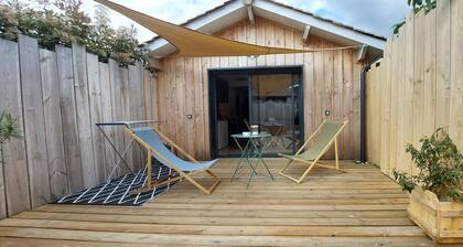 pretty wooden shed with terrace