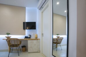 Superior Room, 1 Bedroom | Living area | 32-inch Smart TV with digital channels