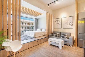 Suite Junior, vue piscine | 1 chambre, literie de qualité supérieure, minibar