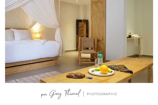 Premium bedding, down comforters, minibar, in-room safe