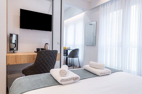 1 chambre, coffres-forts dans les chambres, fer et planche à repasser