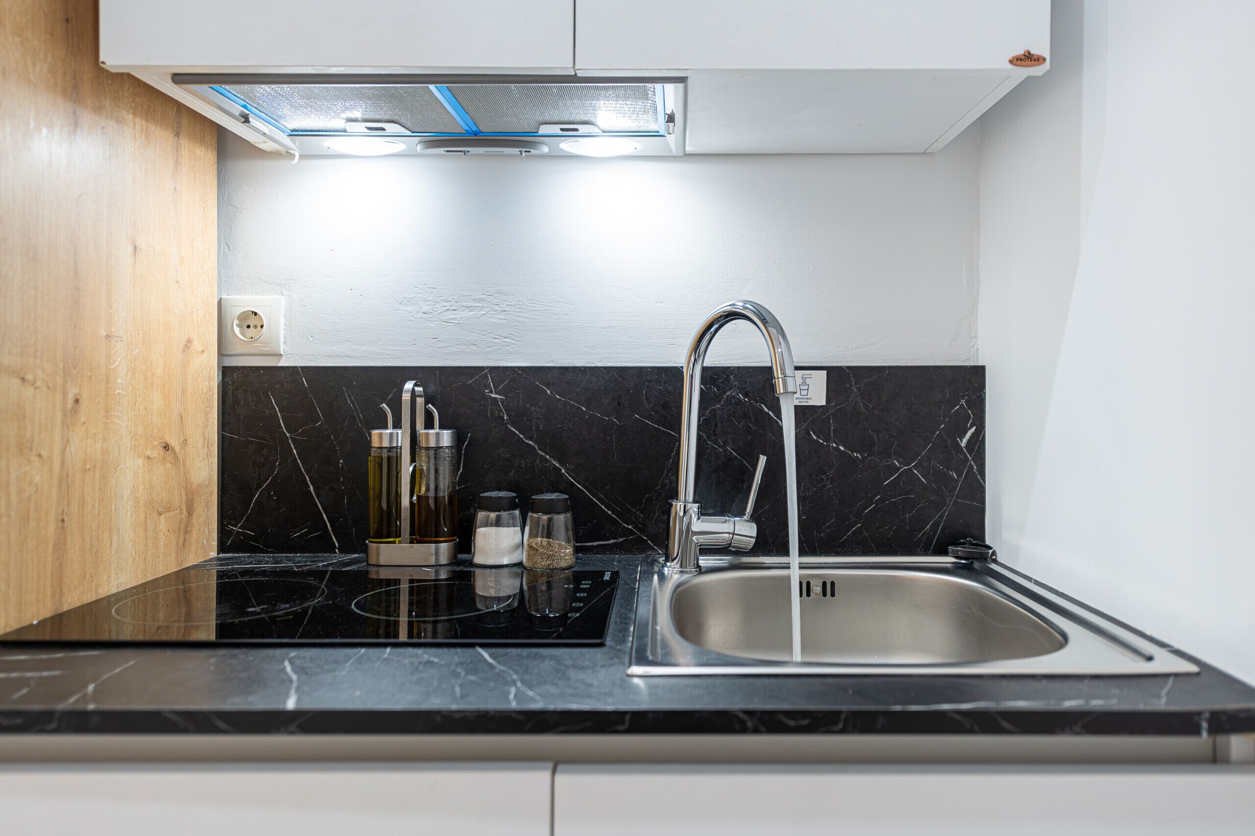 Fridge, coffee/tea maker, electric kettle, cookware/dishes/utensils