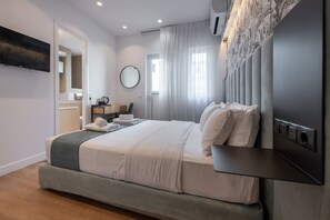 1 chambre, coffres-forts dans les chambres, fer et planche à repasser