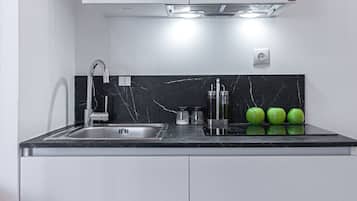 Fridge, coffee/tea maker, electric kettle, cookware/dishes/utensils
