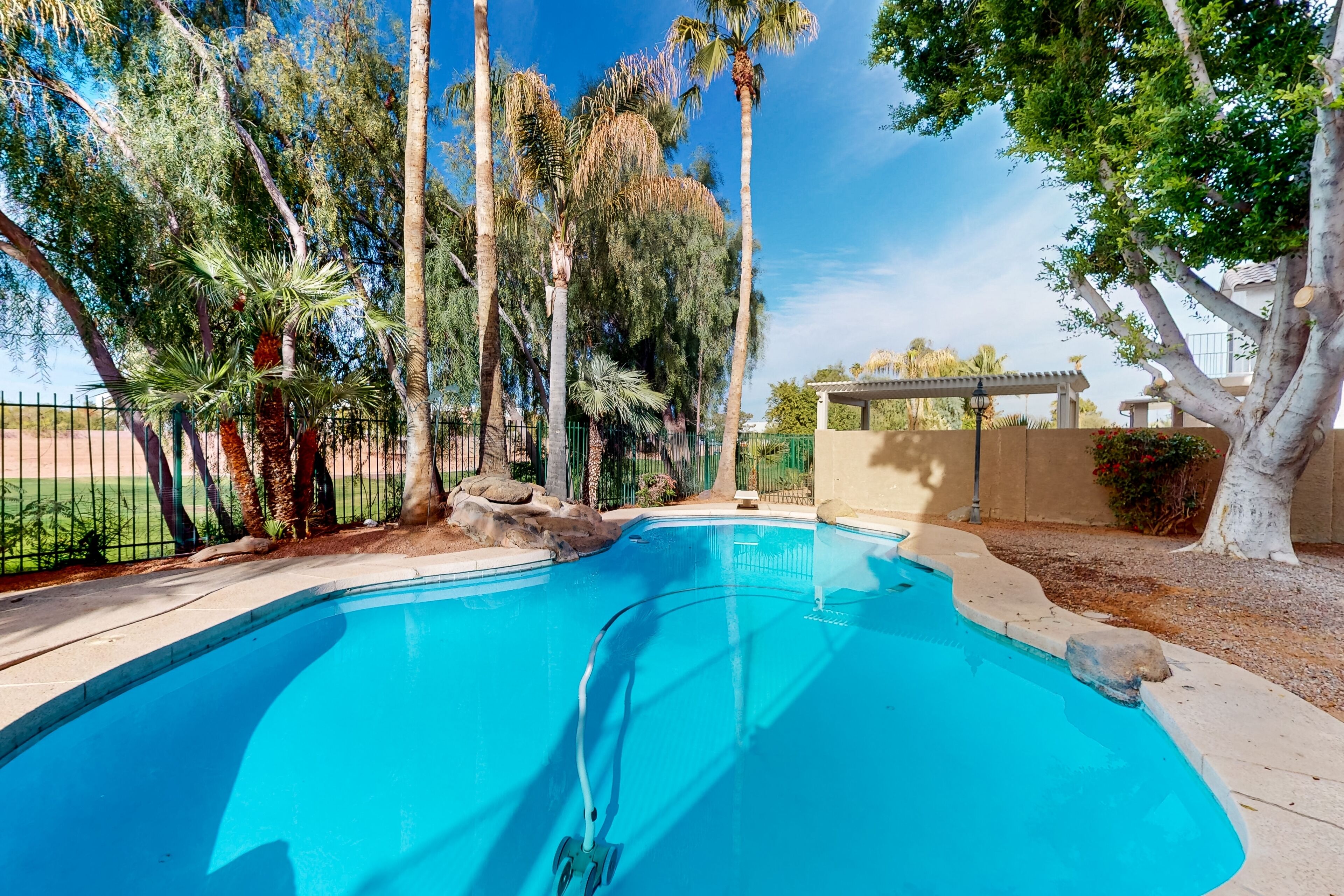 Light-filled desert home with private pool, grill, jetted tub, mtn views, & W/D