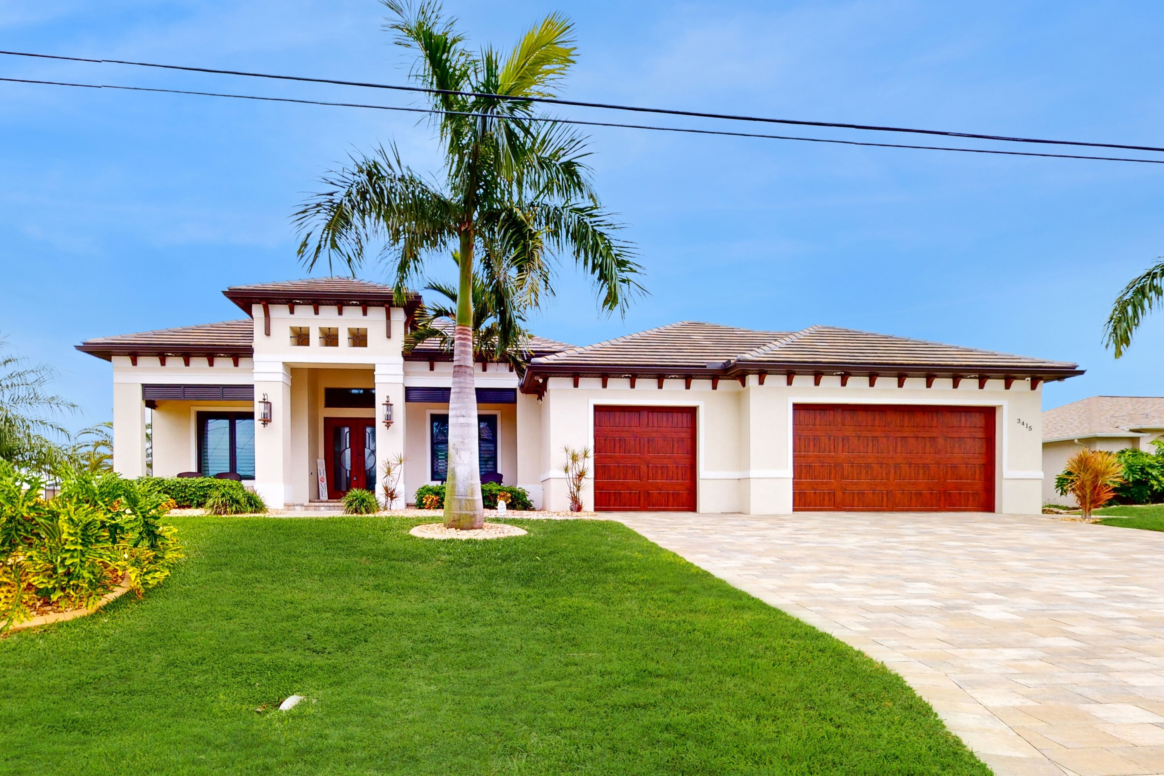 Snowbird-friendly waterfront oasis with pool overlooking the bay & lush patio