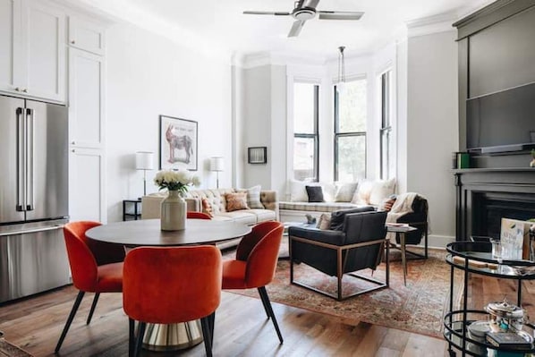 Smart TV, fireplace, books